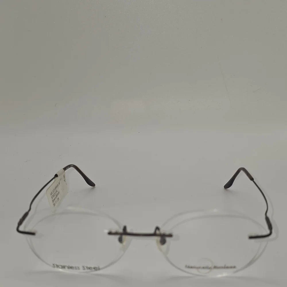 Naturally‎ Rimless NR 372 Eyeglasses Frame 50-17-135 Brown
